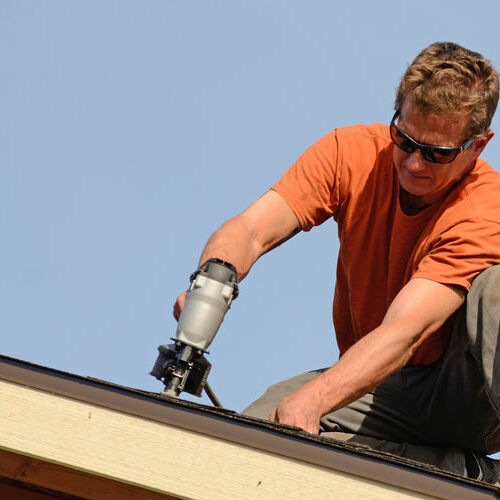 A Roofer Shingles a Roof.