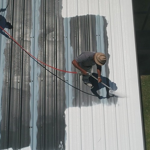 A Roof Applies a Metal Roof Coating.